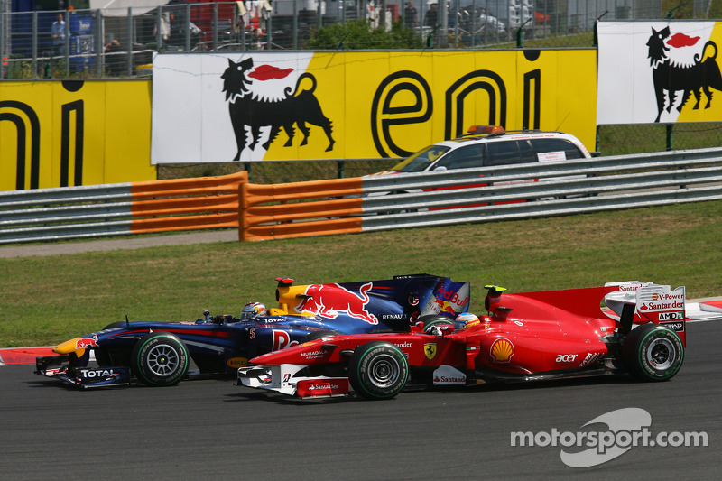 f1-hungarian-gp-2010-sebastian-vettel-red-bull-racing-and-fernando-alonso-scuderia-ferrari Sebastian Vettel, Red Bull Racing y Fernando Alonso, Scuderia Ferrari al inicio de la carrera
