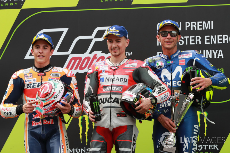 Podio: 1º Lorenzo, 2º Márquez, 3º Rossi