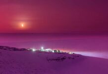 A volcanic glow bathes Antarctica in spectacular colors