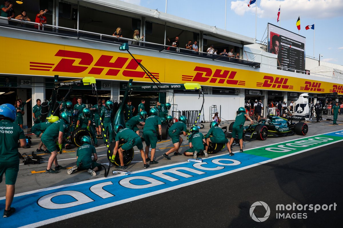 Sebastian Vettel, Aston Martin AMR22, makes a pit stop during FP2