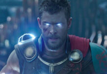 Chris Hemsworth shows off his arms at the end of "Thor: Love and Thunder"