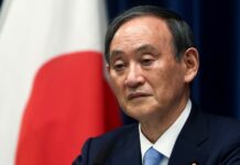 Japan extends state of emergency into Olympics weeks