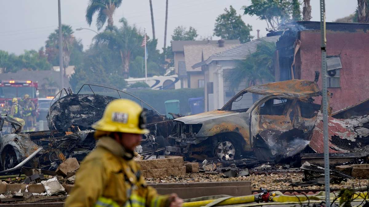 At least two dead after plane crash on residential buildings