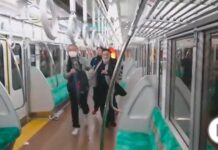 A man disguised as the 'Joker' sets fire to a subway car in Tokyo, injuring at least 17