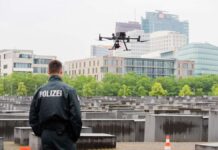 Berlin: Police do push-ups on the Holocaust memorial