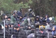 A group of 50 immigrants break the barbed wire and enter Poland but are arrested