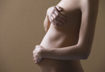 Why are blue veins visible on a pregnant woman's breasts?