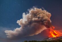 Etna erupts again: Spectacular images show lava fountains and columns of smoke