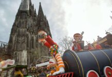 The Cologne Carnival Monday car is driving in the stadium this year