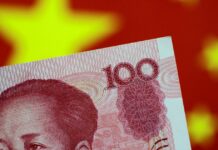 China's central bank cuts its interest rate to boost its economy