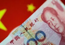 China revives currency risk reserve requirement