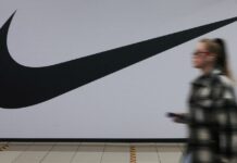 Nike reports lower profits on rising costs and a strong dollar